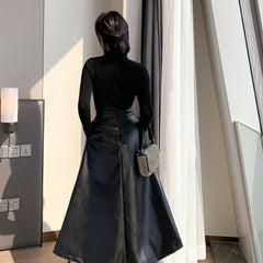 Black Mid-length Skirt With A High Waist And Slimming Hips
